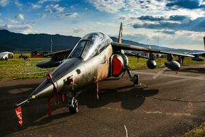 Military trainer plane at air base. Air force flight operation. Aviation and aircraft. Air defense. Military industry. Fly and flying. photo