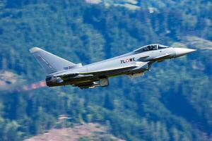 Military fighter jet plane at air base. Air force flight operation. Aviation and aircraft. Air defense. Military industry. Fly and flying. photo