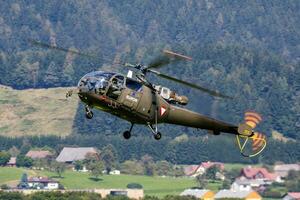 Military helicopter at air base. Air force flight operation. Aviation and aircraft. Air defense. Military industry. Fly and flying. photo