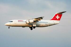 Swiss International Airlines passenger plane at airport. Schedule flight travel. Aviation and aircraft. Air transport. Global international transportation. Fly and flying. photo