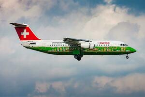 Swiss International Airlines passenger plane at airport. Schedule flight travel. Aviation and aircraft. Air transport. Global international transportation. Fly and flying. photo