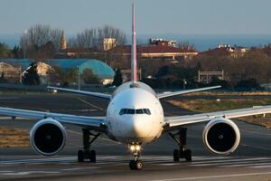 Turkish Airlines Boeing 777-300ER TC-LKA passenger plane departure at Istanbul Ataturk Airport photo