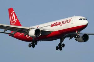 Atlasglobal Airbus A330-200 TC-AGL passenger plane landing at Istanbul Ataturk Airport photo