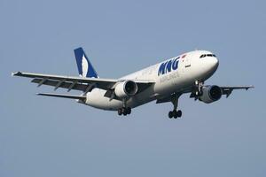 MNG Airlines Airbus A300 TC-MCG cargo plane arrival and landing at Istanbul Ataturk Airport photo