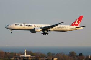 Turkish Airlines Boeing 777-300ER TC-JJR passenger plane landing at Istanbul Ataturk Airport photo