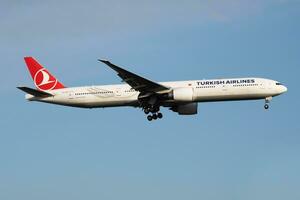 Turkish Airlines Boeing 777-300ER TC-LJE passenger plane landing at Istanbul Ataturk Airport photo