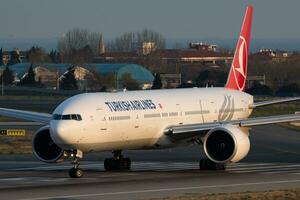 Turkish Airlines Boeing 777-300ER TC-LKA passenger plane departure at Istanbul Ataturk Airport photo