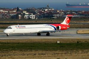 ATA Airlines MD-83 EP-TAS passenger plane departure at Istanbul Ataturk Airport photo