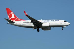 Turkish Airlines Boeing 737-700 TC-JKO passenger plane landing at Istanbul Ataturk Airport photo