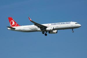 Turkish Airlines Airbus A321 TC-JTE passenger plane arrival and landing at Istanbul Ataturk Airport photo