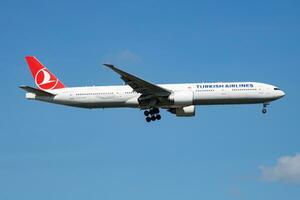 Turkish Airlines Boeing 777-300ER TC-JJT passenger plane landing at Istanbul Ataturk Airport photo