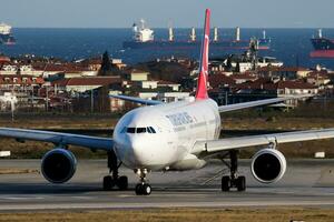 Turkish Airlines Airbus A330-300 TC-JOK passenger plane departure at Istanbul Ataturk Airport photo