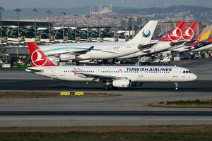 Turkish Airlines Airbus A321 TC-JRK passenger plane departure at Istanbul Ataturk Airport photo