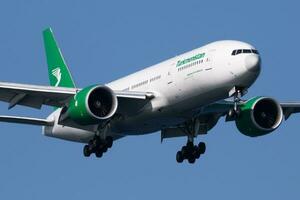 Turkmenistan Airlines Boeing 777-200 EZ-A779 passenger plane arrival and landing at Istanbul Ataturk Airport photo