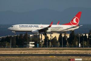 Turkish Airlines Boeing 737-900 TC-JZH passenger plane landing at Istanbul Ataturk Airport photo