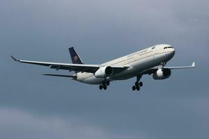 Saudia Airbus A330-300 HZ-AQ24 passenger plane landing at Istanbul Ataturk Airport photo