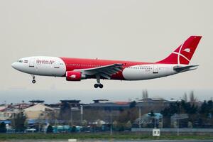 Qeshm Air Airbus A300 EP-FQM passenger plane arrival and landing at Istanbul Ataturk Airport photo