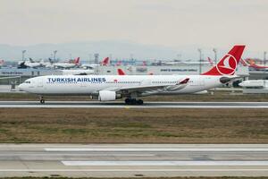 Turkish Airlines Airbus A330-300 TC-JOE passenger plane departure at Istanbul Ataturk Airport photo