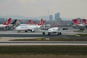 Turkish Airlines Airbus A330-200 TC-JNA passenger plane departure at Istanbul Ataturk Airport photo