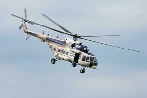 Government police helicopter at airport. Aviation and aircraft. Commercial and general aviation. Aviation industry. Fly and flying. photo