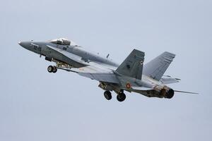 Military fighter jet plane at air base. Air force flight operation. Aviation and aircraft. Air defense. Military industry. Fly and flying. photo