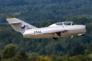 Old timer warbird at air base. Aviation and aircraft. Air defense. Military industry. Fly and flying. photo