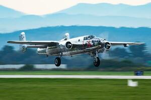 Old timer warbird at air base. Aviation and aircraft. Air defense. Military industry. Fly and flying. photo