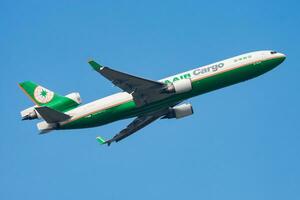 EVA Air cargo plane at airport. Air freight and shipping. Aviation and aircraft. Transport industry. Global international transportation. Fly and flying. photo