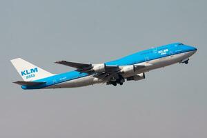 KLM Royal Dutch Airlines Boeing 747-400 PH-BFP passenger plane departure and take off at Hong Kong Chek Lap Kok Airport photo