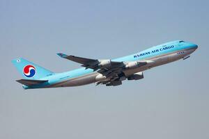 Korean Air Cargo Boeing 747-400 HL7466 cargo plane departure and take off at Hong Kong Chek Lap Kok Airport photo