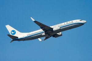 Xiamen Airlines Boeing 737-800 B-5535 passenger plane departure and take off at Hong Kong Chek Lap Kok Airport photo