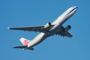 China Airlines Airbus A330-300 B-18308 passenger plane departure and take off at Hong Kong Chek Lap Kok Airport photo