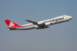 Cargolux Boeing 747-8 LX-VCH cargo plane departure and take off at Hong Kong Chek Lap Kok Airport photo