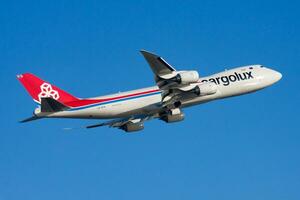 Cargolux Boeing 747-8 LX-VCA cargo plane departure and take off at Hong Kong Chek Lap Kok Airport photo