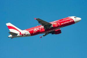 AirAsia Airbus A320 9M-AHG passenger plane departure and take off at Hong Kong Chek Lap Kok Airport photo