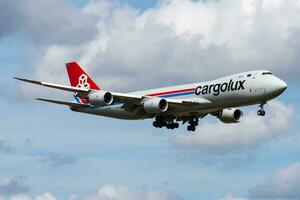 Cargolux Boeing 747-8 LX-VCB cargo plane arrival and landing at Amsterdam Schipol Airport photo