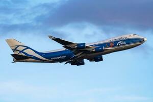 AirBridgeCargo cargo plane at airport. Air freight shipping. Aviation and aircraft. Air transport. Global international transportation. Fly and flying. photo