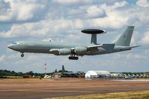 Royal Air Force Boeing E-3D AWACS ZH103 airborne command aircraft arrival and landing for RIAT Royal International Air Tattoo 2018 airshow photo