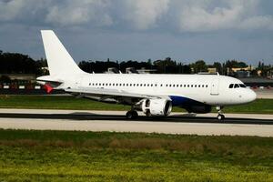 Untitled passenger plane at airport. Aviation industry and aircraft. Air transport and flight travel. International transportation. Fly and flying. Creative photography. photo