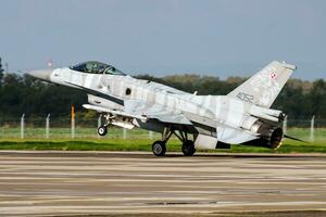 Military fighter jet plane at air base. Air force flight operation. Aviation and aircraft. Air defense. Military industry. Fly and flying. photo