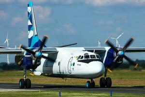 Vulkan Air cargo plane at airport. Air freight and shipping. Aviation and aircraft. Transport industry. Global international transportation. Fly and flying. photo