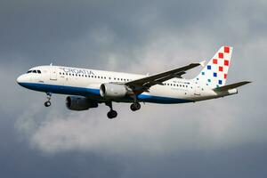 Croatia Airlines passenger plane at airport. Schedule flight travel. Aviation and aircraft. Air transport. Global international transportation. Fly and flying. photo