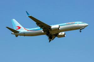 Neos Boeing 737 MAX 8 passenger plane at airport. Aviation and aircraft. Air transport and travel. Fly and flying. photo