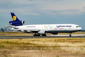 Lufthansa cargo plane at airport. Air freight shipping. Aviation and aircraft. Air transport. Global international transportation. Fly and flying. photo