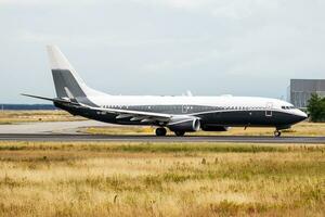 Civilian plane at airport. Business jet and aircraft. Commercial and general aviation. Aviation industry. Fly and flying. photo