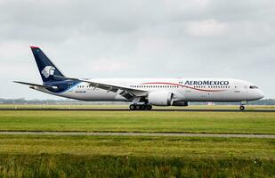 Aeromexico passenger plane at airport. Schedule flight travel. Aviation and aircraft. Air transport. Global international transportation. Fly and flying. photo