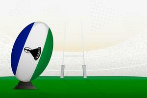 Lesotho national team rugby ball on rugby stadium and goal posts, preparing for a penalty or free kick. vector