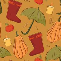 Autumn vector seamless pattern in warm colors. Pumpkin and apple, rubber boots and an umbrella from the rain.