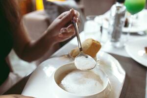 Luxury table settings for fine dining served and decorated table with food for guests in the restaurant photo