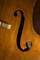 brown double bass musical instrument in forming a background photo